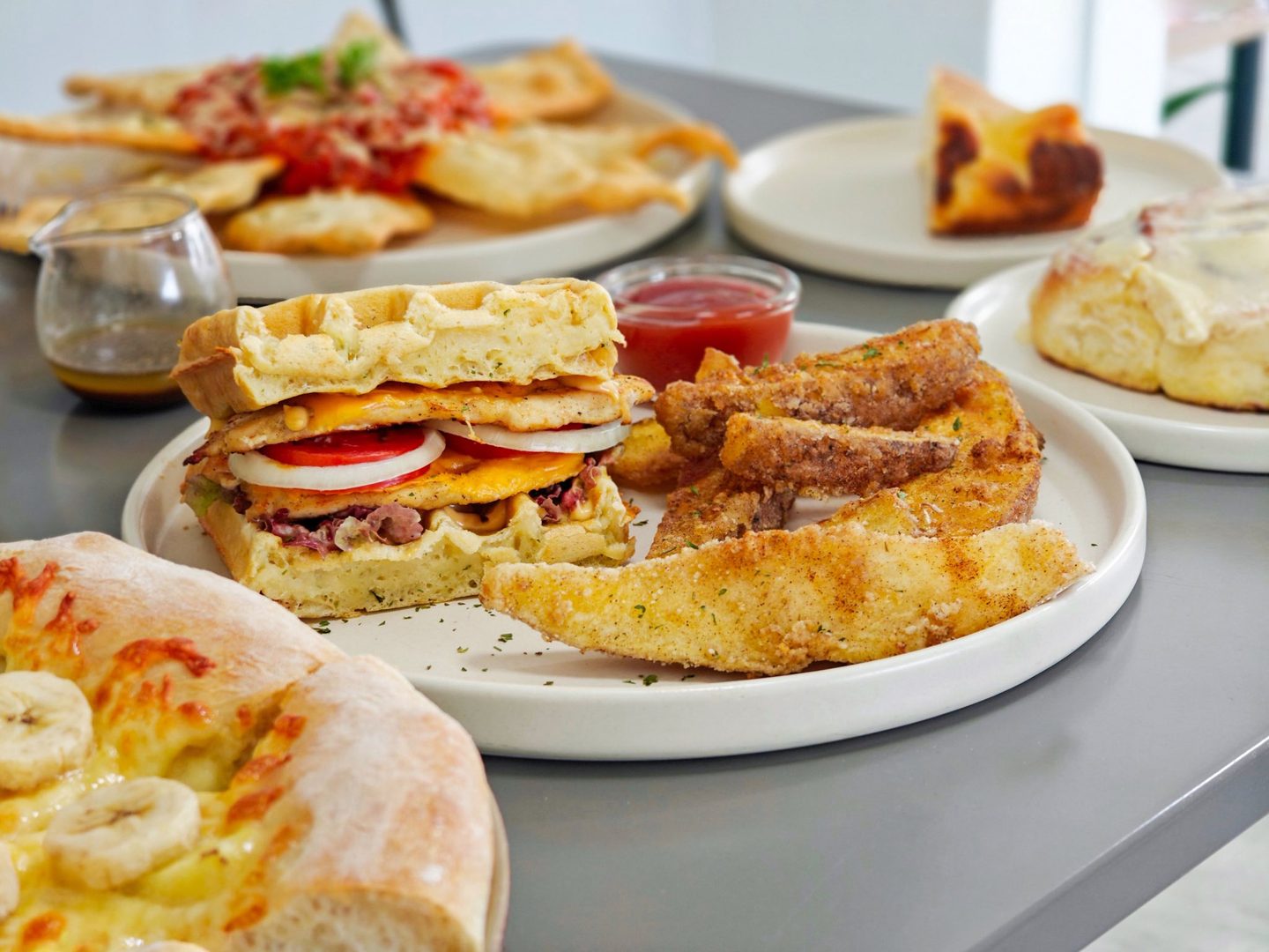 A table full of KYRO dishes and pastries