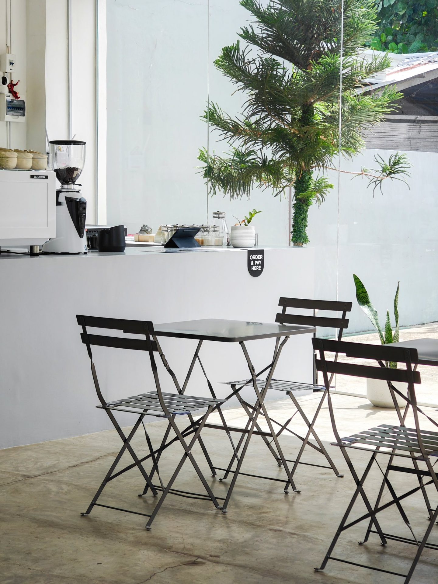 Minimal cafe seating area at KYRO
